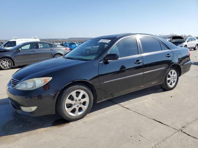 TOYOTA CAMRY LE 2005 with VIN 4T1BF32K75U099628 - Photo from auction