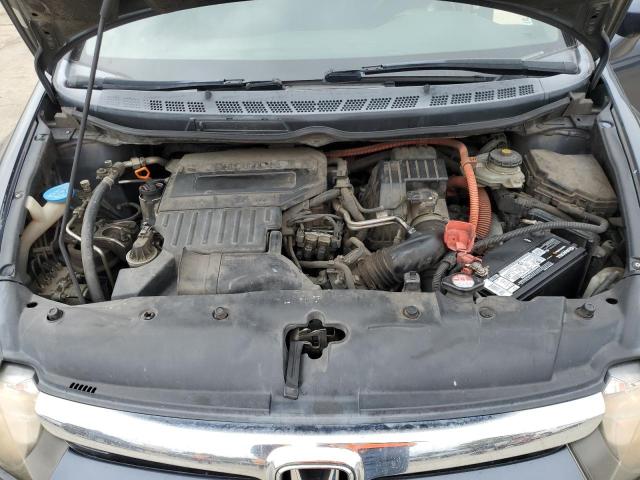 Photo 11 from auction – 2006 HONDA CIVIC HYBR with VIN JHMFA36206S024361