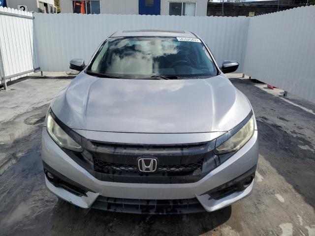 Photo 5 from auction – 2016 HONDA CIVIC EX with VIN 2HGFC2F77GH570666
