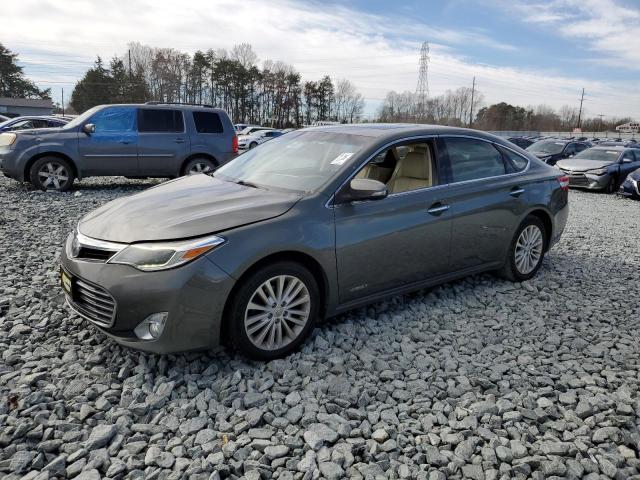 TOYOTA AVALON HYB 2014 with VIN 4T1BD1EB7EU029990 - Photo from auction