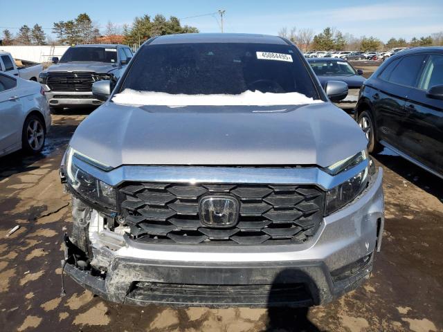 Снимка 5 от търг – 2023 HONDA PASSPORT E с VIN 5FNYF8H5XPB036645
