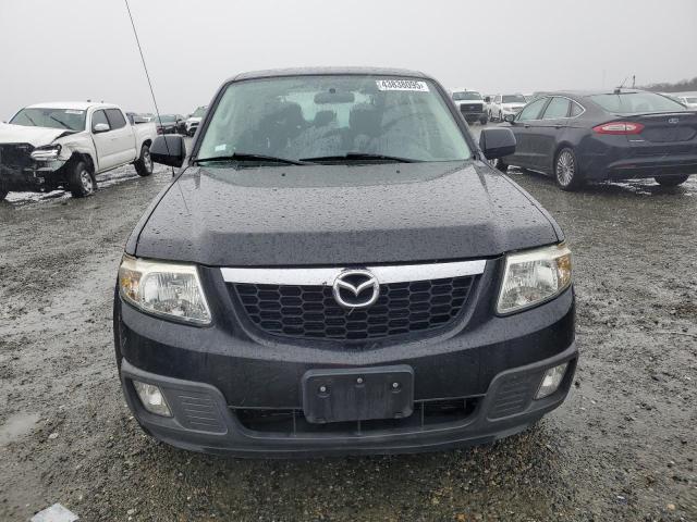 Photo 5 from auction – 2011 MAZDA TRIBUTE I with VIN 4F2CY0C79BKM01536