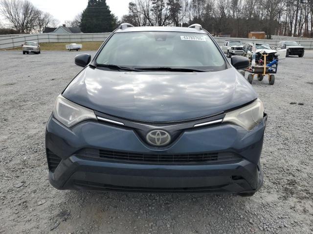 Photo 5 from auction – 2017 TOYOTA RAV4 LE with VIN JTMZFREV8HJ107981
