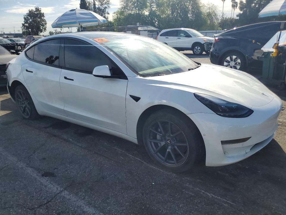 Photo 4 from auction – 2021 TESLA MODEL 3 with VIN 5YJ3E1EA2MF873214
