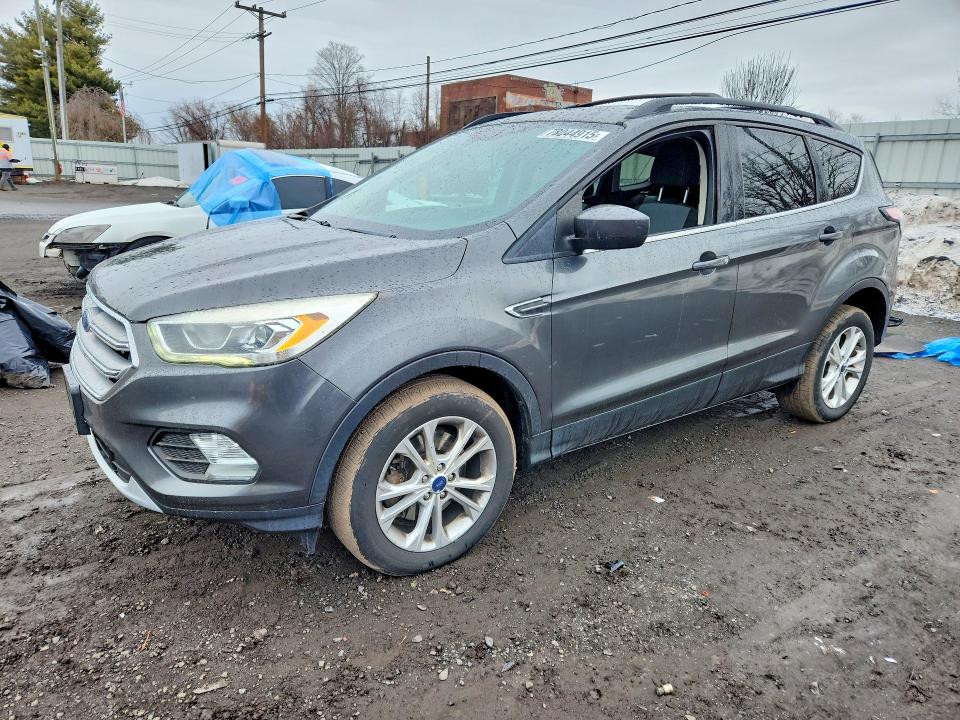 FORD ESCAPE 2017 with VIN 1FMCU9GD2HUC70488 - Photo from auction