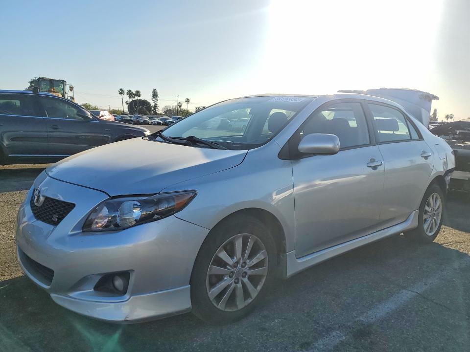 TOYOTA COROLLA 2010 with VIN 1NXBU4EE3AZ305362 - Photo from auction