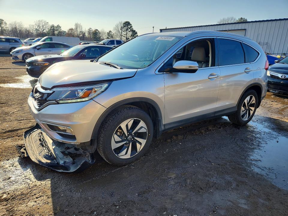 HONDA CR-V TOURI 2016 with VIN 5J6RM3H93GL017717 - Photo from auction