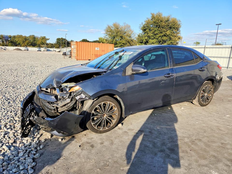TOYOTA COROLLA 2015 with VIN 5YFBURHE6FP281821 - Photo from auction