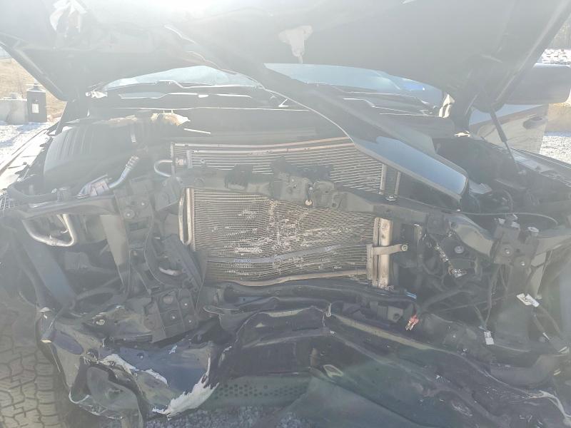 Photo 11 from auction – 2023 RAM TRUCKS 1500 with VIN 1C6RRFGG0PN653130