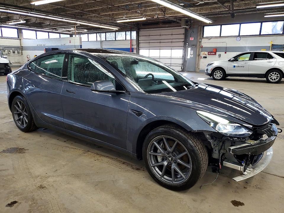 Photo 4 from auction – 2022 TESLA MODEL 3 with VIN 5YJ3E1EA4NF287065