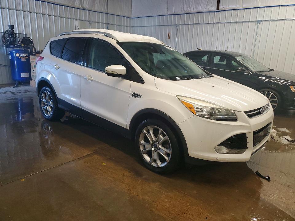 Photo 4 from auction – 2016 FORD ESCAPE TIT with VIN 1FMCU9J97GUC38767