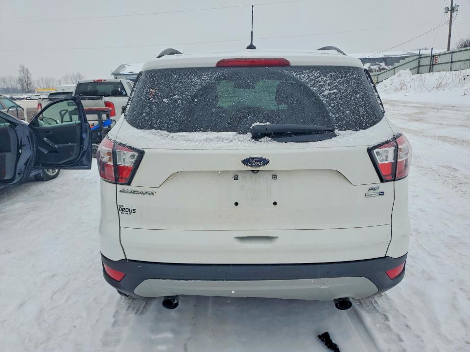 Photo 6 from auction – 2018 FORD ESCAPE with VIN 1FMCU9GDXJUB60181