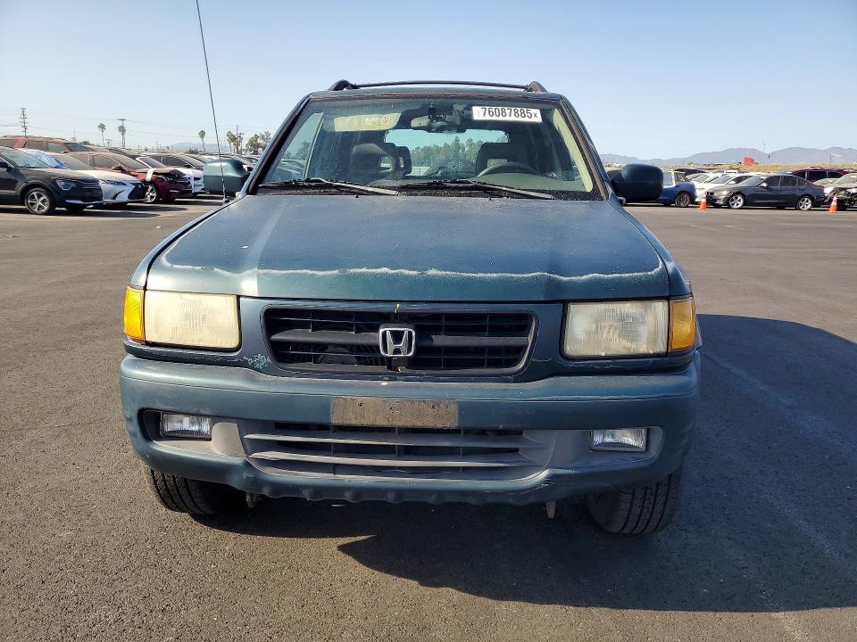 Photo 5 from auction – 1999 HONDA PASSPORT E with VIN 4S6CK58W4X4413669