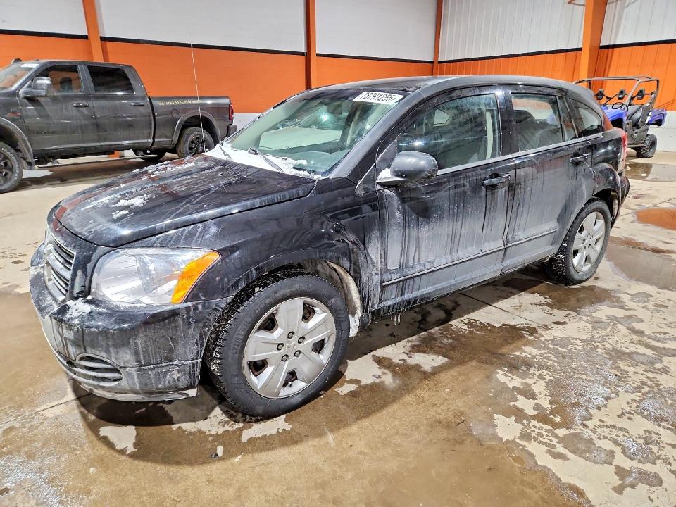 DODGE CALIBER 2009 with VIN 1B3HB48A89D240969 - Photo from auction