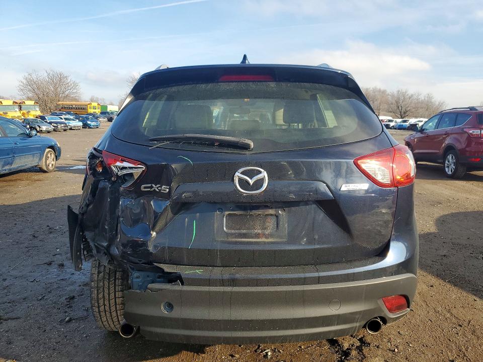 Photo 6 from auction – 2015 MAZDA CX-5 with VIN JM3KE2BE9F0522365