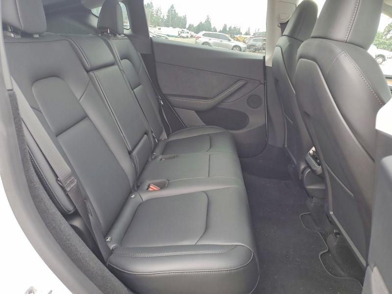 Photo 11 from auction – 2023 TESLA MODEL Y with VIN 7SAYGDEE5PA120043