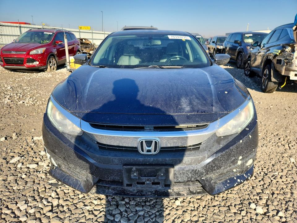 Photo 5 from auction – 2017 HONDA CIVIC with VIN 2HGFC1F73HH649988