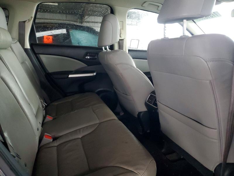 Photo 11 from auction – 2015 HONDA CR-V with VIN 2HKRM3H79FH544216