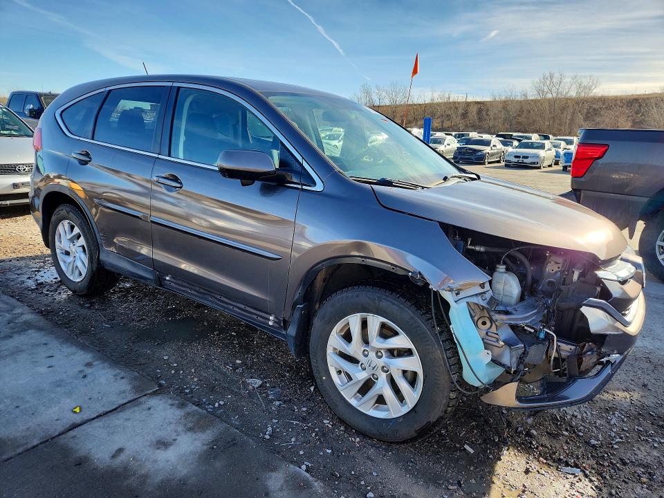 Photo 4 from auction – 2015 HONDA CR-V with VIN 3CZRM3H50FG703478