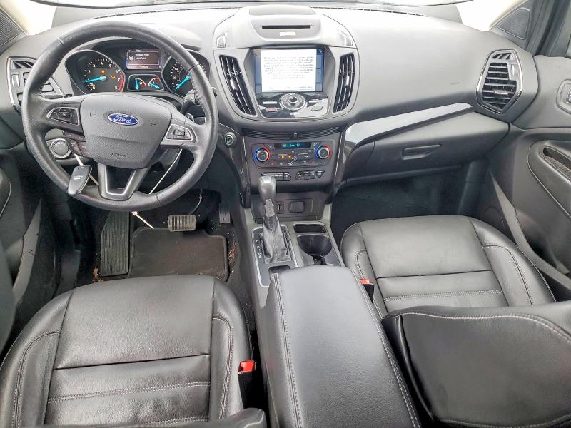 Photo 8 from auction – 2017 FORD ESCAPE TIT with VIN 1FMCU9J94HUC93582