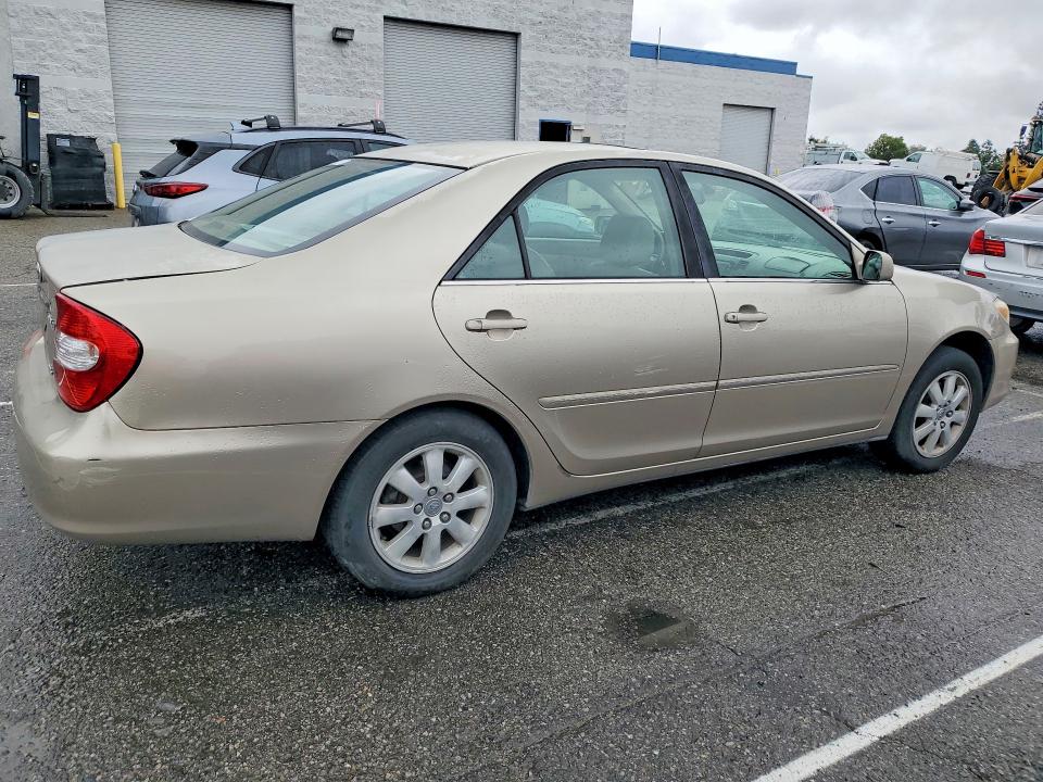 Photo 3 from auction – 2002 TOYOTA CAMRY LE with VIN 4T1BF30KX2U541784