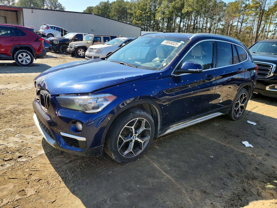 BMW X1 2018 with VIN WBXHT3C39J3H30089 - Photo from auction