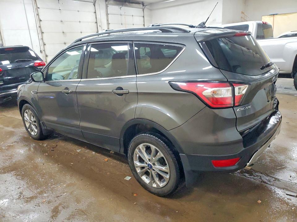 Photo 2 from auction – 2018 FORD ESCAPE with VIN 1FMCU9HD6JUC96810