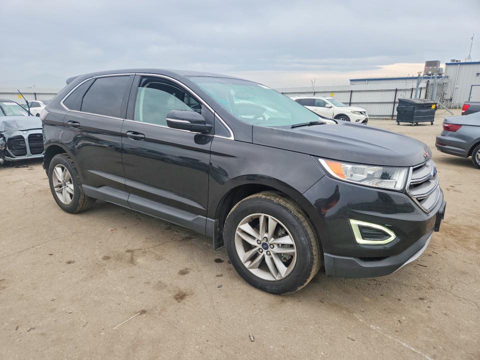 Photo 4 from auction – 2015 FORD EDGE with VIN 2FMTK3J95FBC35051