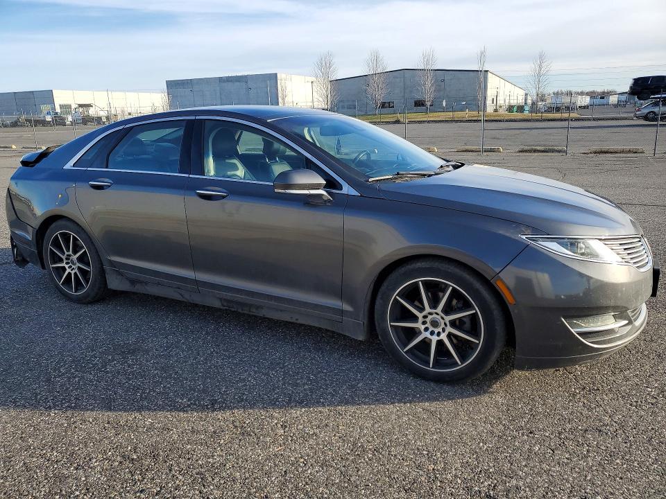 Photo 4 from auction – 2016 LINCOLN MKZ with VIN 3LN6L2LU8GR633945