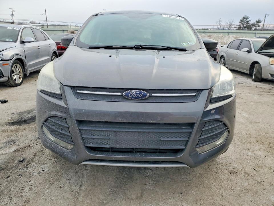 Photo 5 from auction – 2015 FORD ESCAPE SE with VIN 1FMCU0GX3FUB77434