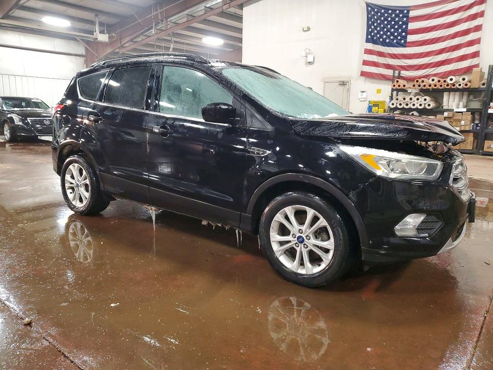 Photo 4 from auction – 2017 FORD ESCAPE with VIN 1FMCU9GD0HUA41517