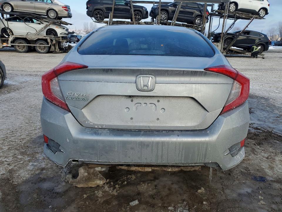 Photo 6 from auction – 2018 HONDA CIVIC LX with VIN 2HGFC2F58JH037084