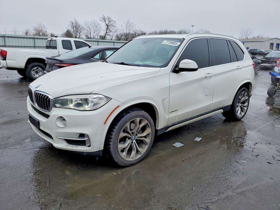 BMW X5 2017 with VIN 5UXKR2C31H0X04105 - Photo from auction