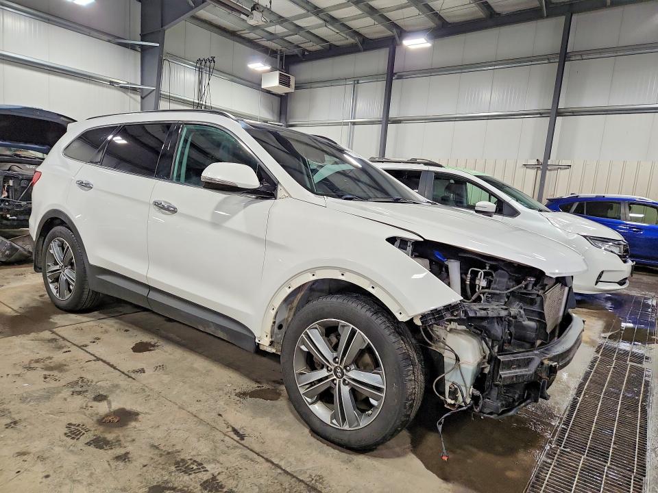Photo 4 from auction – 2016 HYUNDAI SANTA FE S with VIN KM8SRDHF8GU139404
