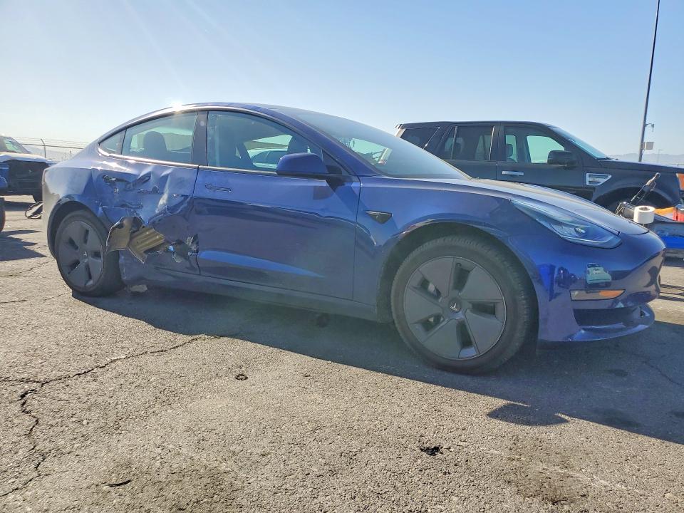 Photo 4 from auction – 2022 TESLA MODEL 3 with VIN 5YJ3E1EA9NF236791