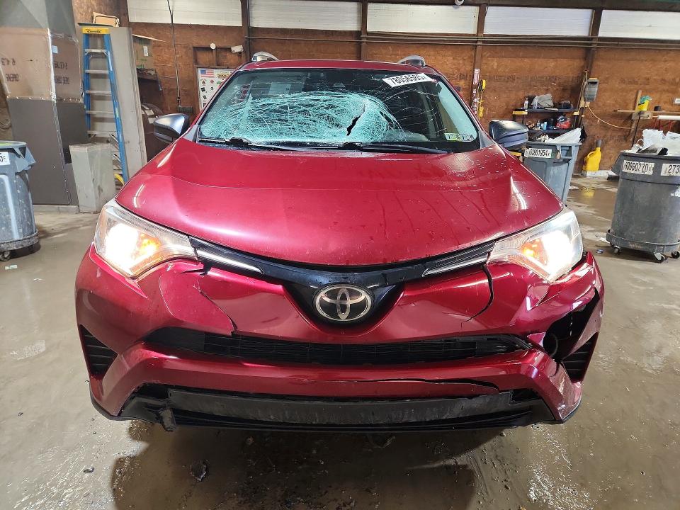 Photo 5 from auction – 2018 TOYOTA RAV4 LE with VIN JTMBFREV0JD236805