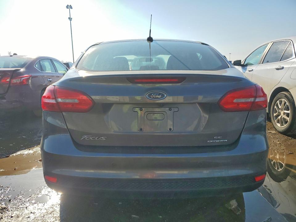 Photo 6 from auction – 2015 FORD FOCUS SE with VIN 1FADP3F24FL374146