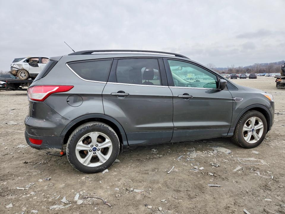 Photo 3 from auction – 2016 FORD ESCAPE with VIN 1FMCU0GX5GUB97024