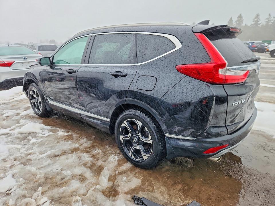 Photo 2 from auction – 2017 HONDA CR-V with VIN 2HKRW2H98HH117750