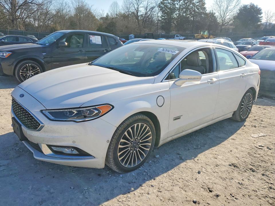 FORD FUSION TIT 2017 with VIN 3FA6P0SU7HR204351 - Photo from auction