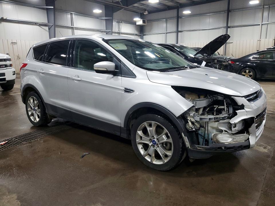 Photo 4 from auction – 2013 FORD ESCAPE with VIN 1FMCU9H96DUA61016