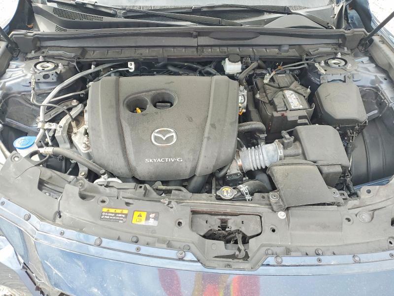 Photo 11 from auction – 2023 MAZDA CX-50 with VIN 7MMVABCM8PN117402