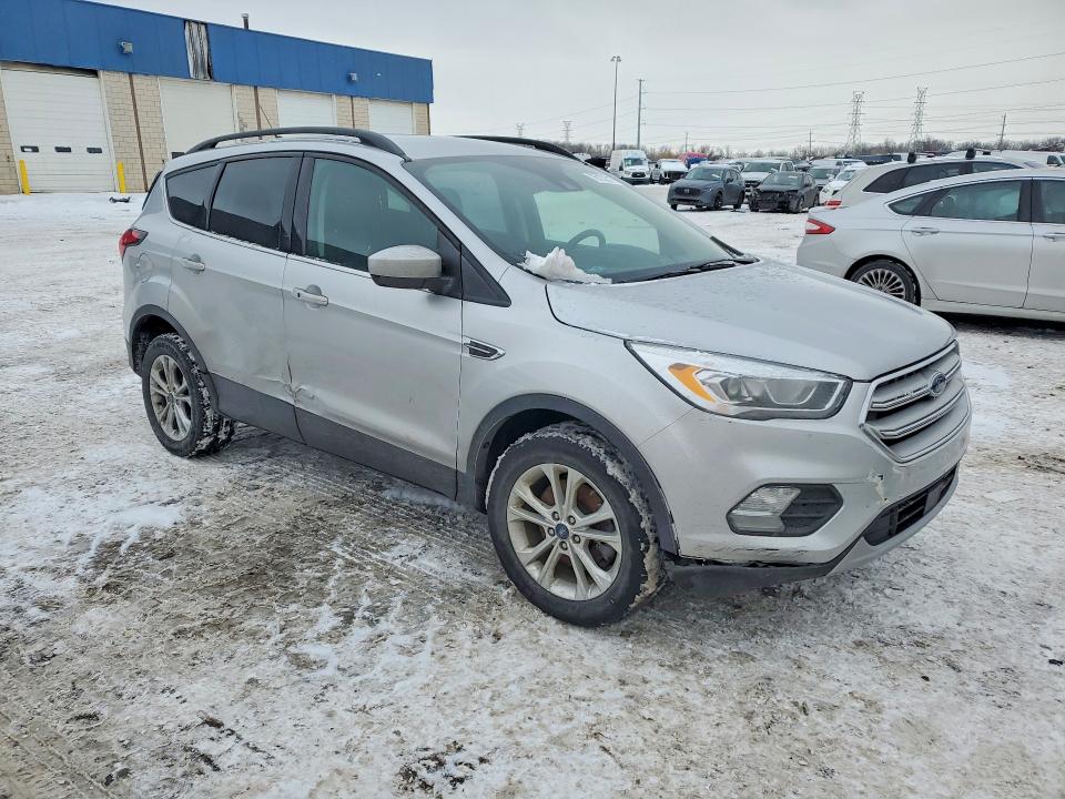 Photo 4 from auction – 2019 FORD ESCAPE with VIN 1FMCU9HD7KUA55856