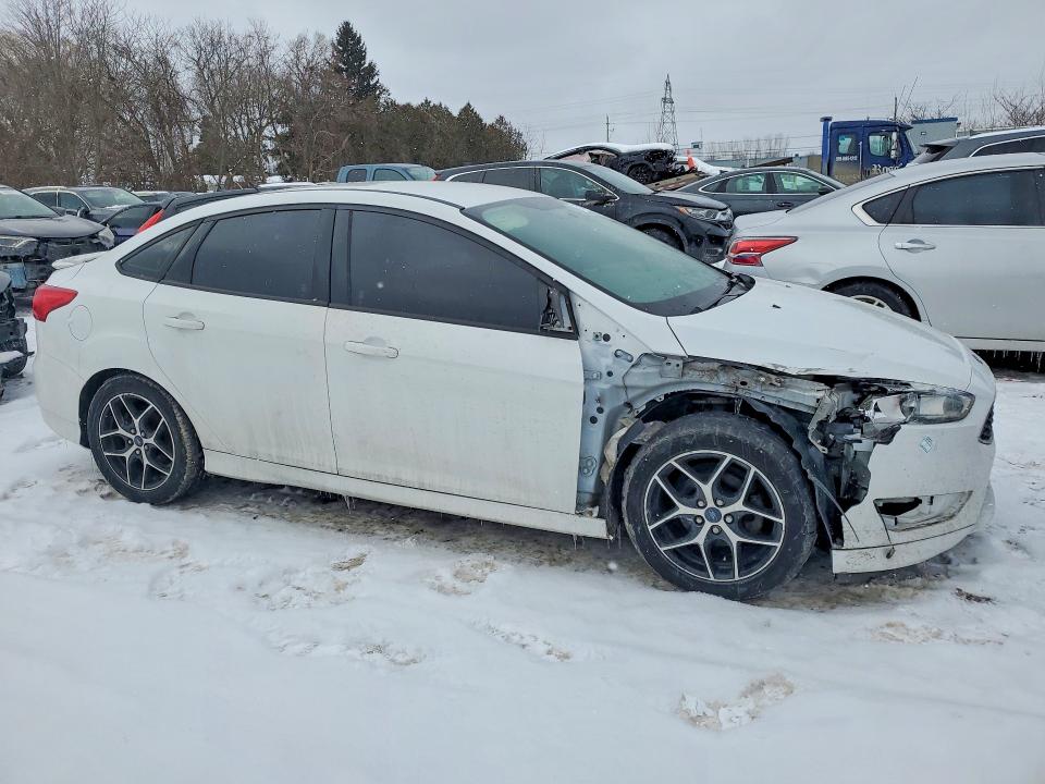 Photo 4 from auction – 2016 FORD FOCUS with VIN 1FADP3F27GL272969