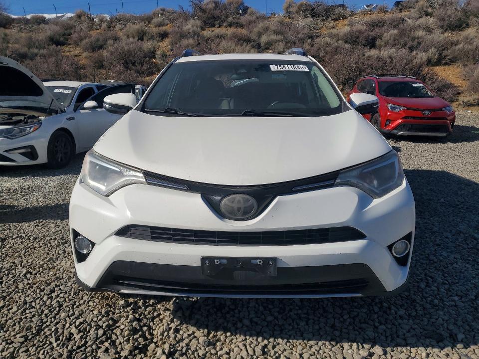 Photo 5 from auction – 2017 TOYOTA RAV4 XLE with VIN JTMRFREV7HJ710954