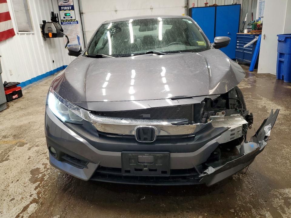 Photo 5 from auction – 2016 HONDA CIVIC with VIN 2HGFC3B32GH355298