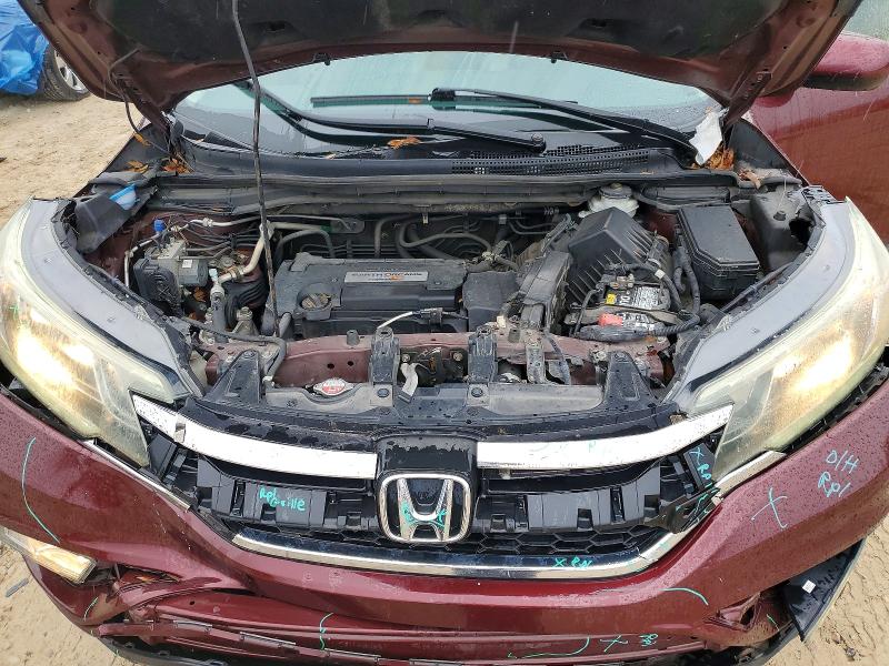 Photo 11 from auction – 2015 HONDA CR-V with VIN 2HKRM3H73FH502687