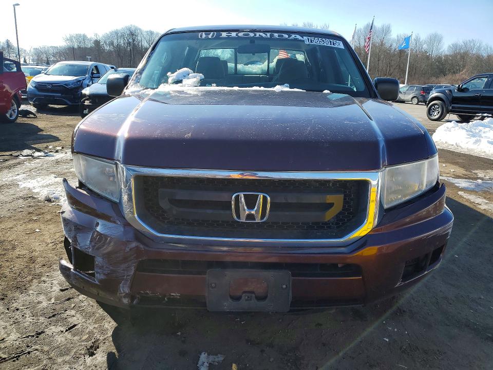 Photo 5 from auction – 2011 HONDA RIDGELINE with VIN 5FPYK1F22BB003568