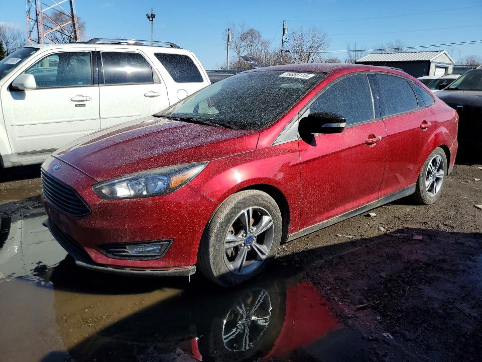 FORD FOCUS 2017 with VIN 1FADP3FE6HL344711 - Photo from auction