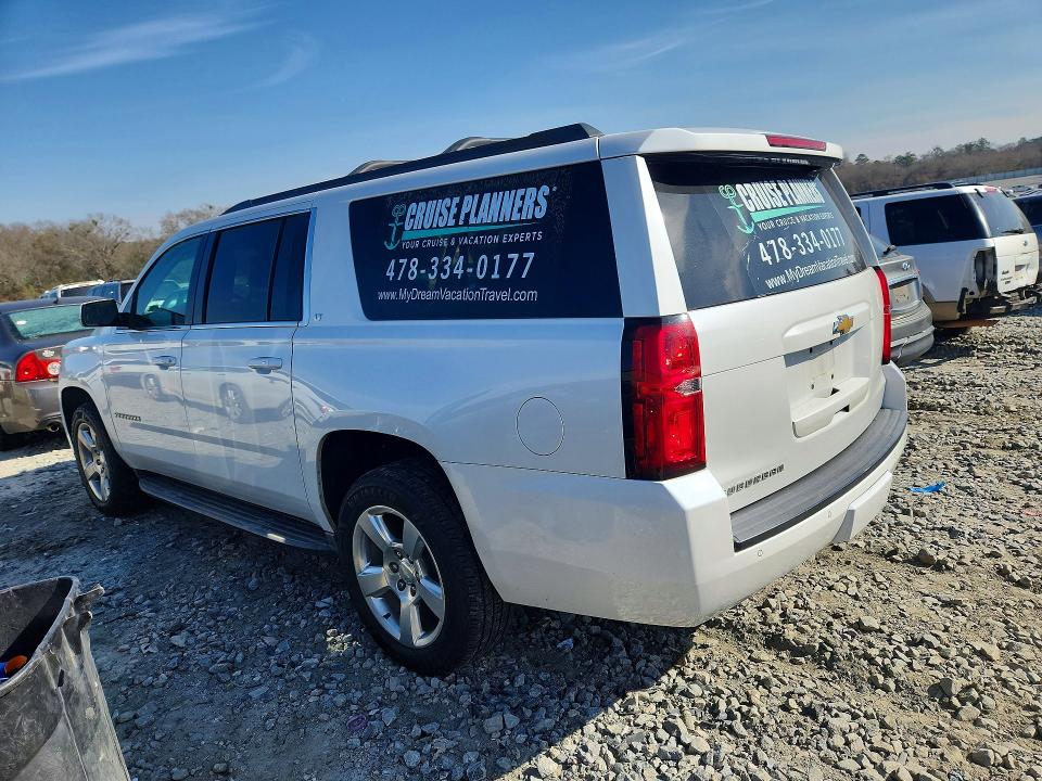 Photo 2 from auction – 2016 CHEVROLET SUBURBAN K with VIN 1GNSKHKC6GR277676